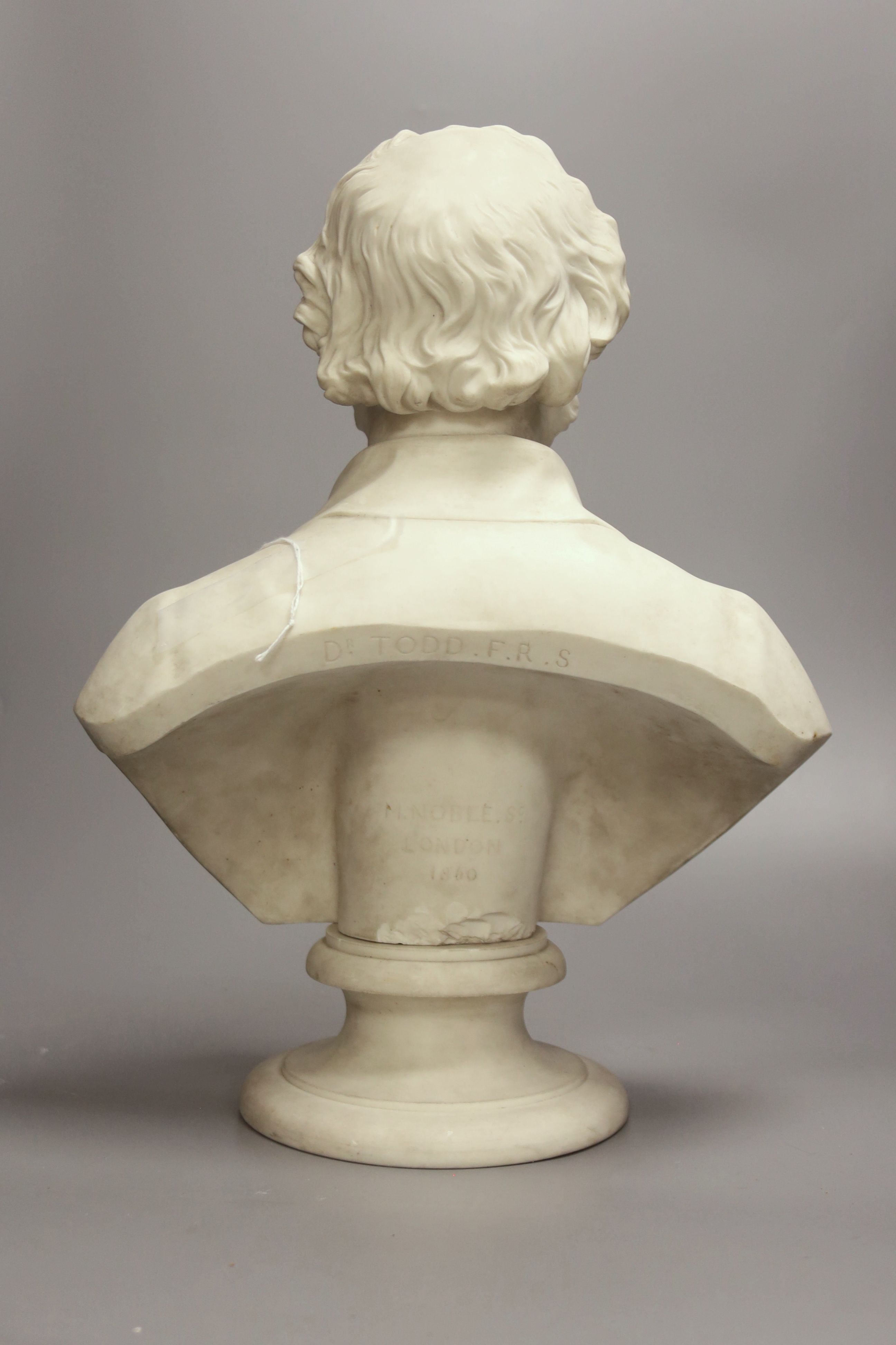 A Parian bust, inscribed verso Dr. Todd. F.R.S., M. Noble.S.c. London 1860, on socle base (a.f.), 38cm high